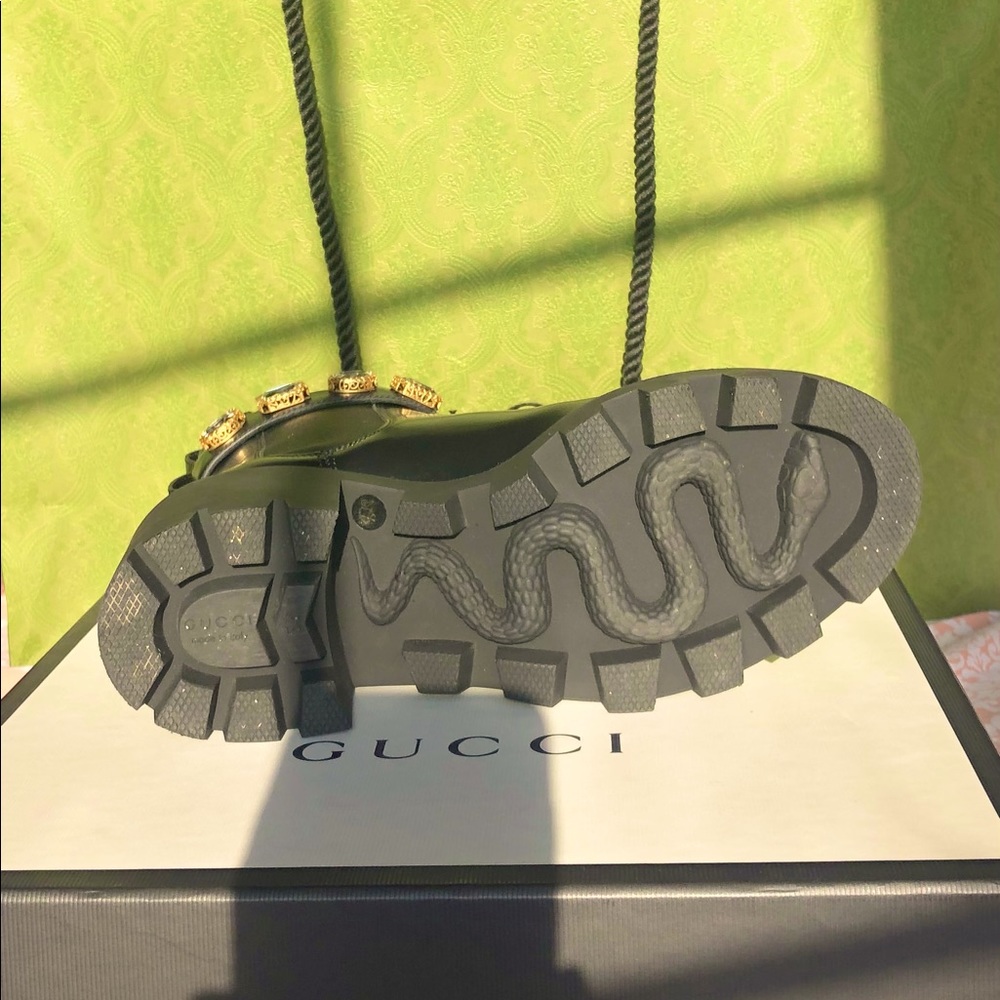 Brand new Gucci leather ankle boot with belt